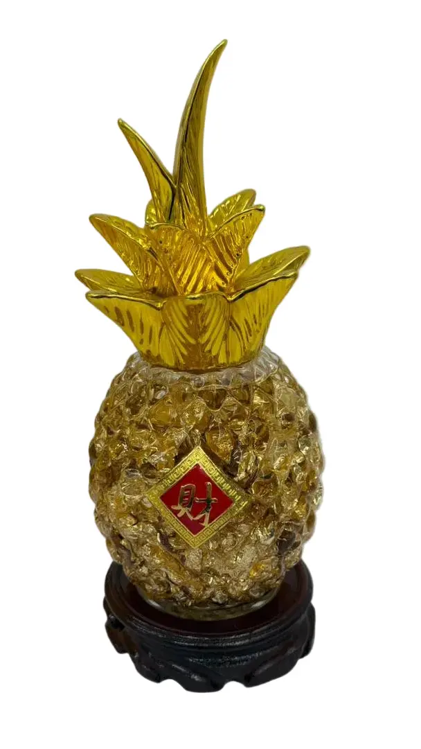 Glass Pineapple With Gold Leaves In Liquid 1